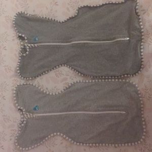 Two grey Love To Dream Swaddles